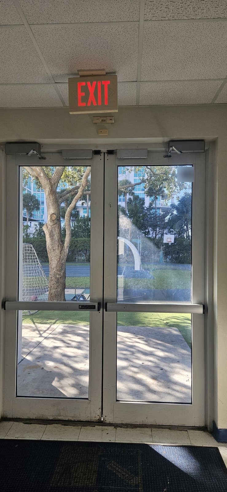 School Double Doors Stopped Closing After an AC Change: LCN 4040XP Door Closers, Aventura photo 2