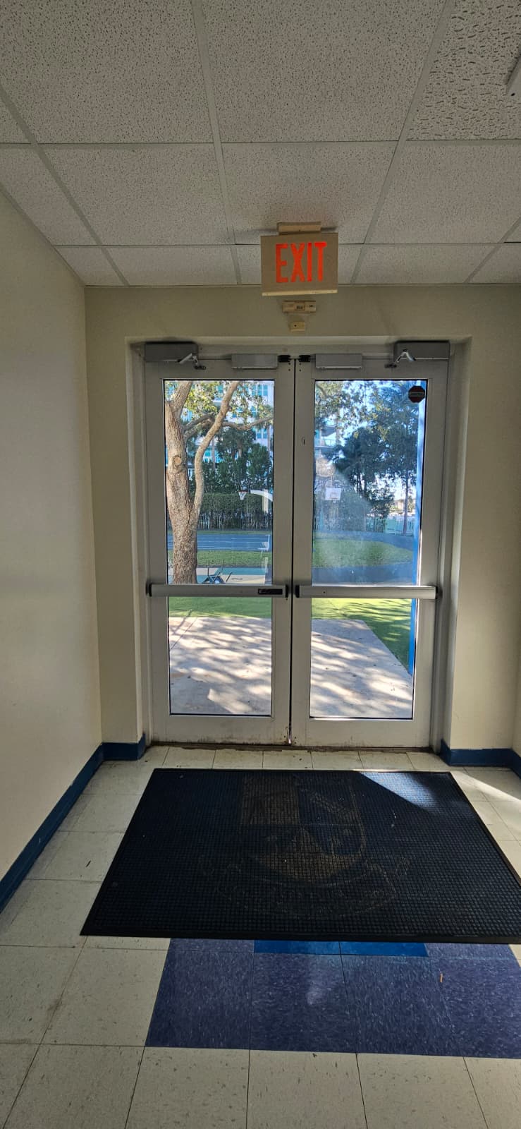 Exterior School Doors Stopped Closing After an HVAC Change in Aventura