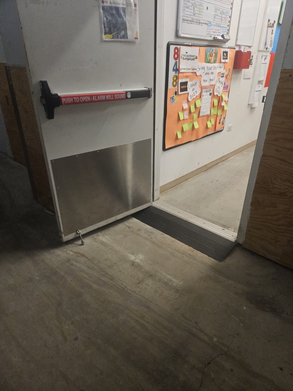 A Step at a Sunrise Stockroom Door Was Blocking Dollies and Carts photo 3