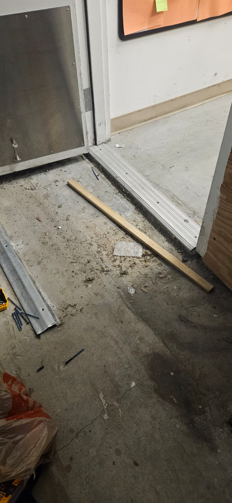 A Step at a Sunrise Stockroom Door Was Blocking Dollies and Carts before